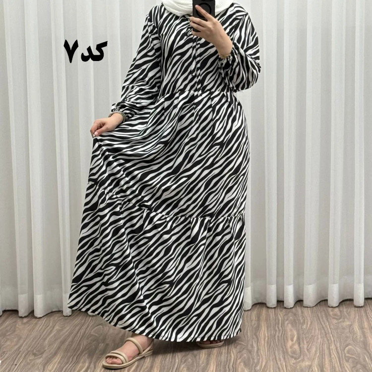 پیراهن ساحلی بوگاتی فری سایز تا 48 شیک و راحت چهارفصل زنانه و دخترانه بدون بدن نما کمربند دار