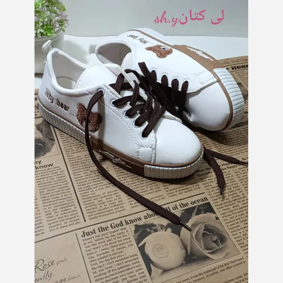 کفش ونس خرسی زنانه جنس لی کتان با زیره پیپیسی و لژ 2 سانت رنگ سفید و مشکی