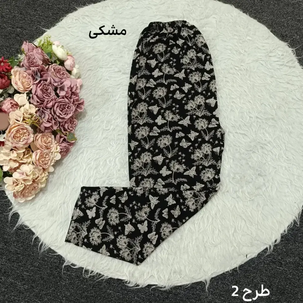 شلوار راحتی زنانه طرح دار سایز بزرگ جنس برداشت نخی فری سایز 44 تا 56