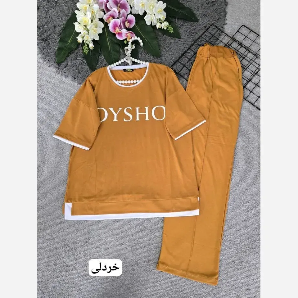 ست تیشرت و شلوار زنانه طرح نوتلا جنس پنبه گلکسی رنگ خردلی فری سایز 36 تا 46
