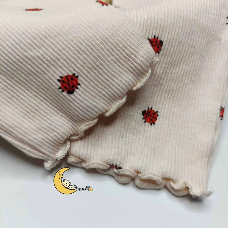 بلوز دخترانه کبریتی طرح کفشدوزک برند next