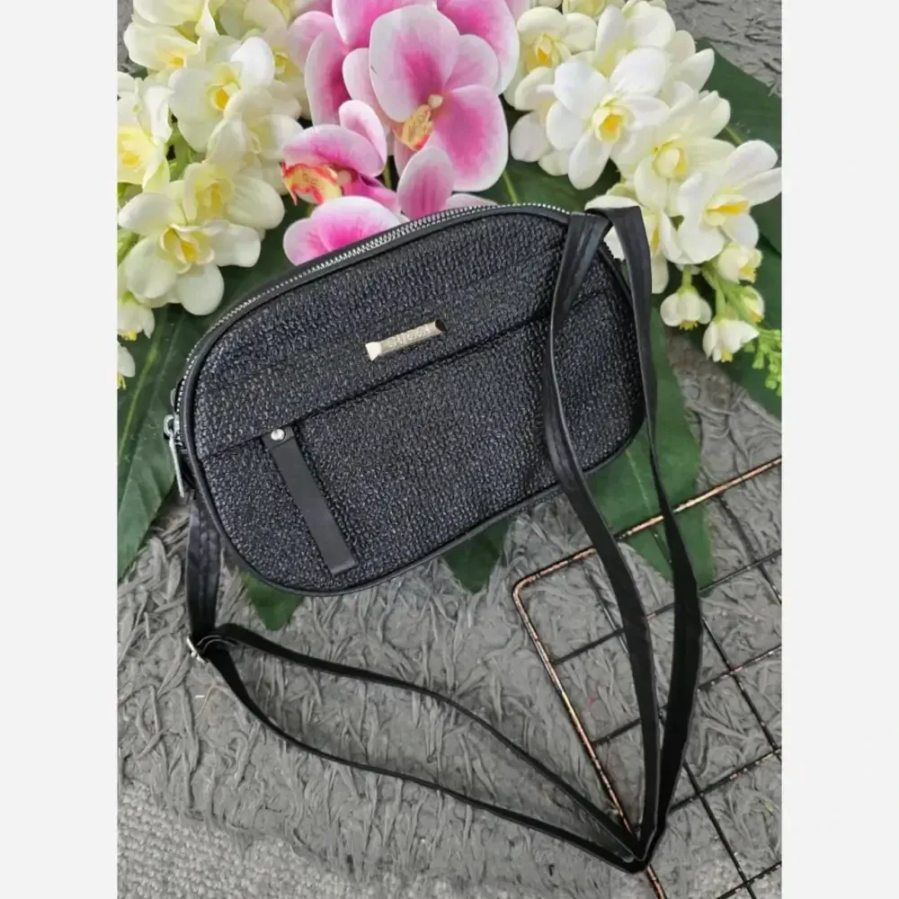 کیف زنانه مدل آیدا جنس چرم طرح کنفی سه خونه