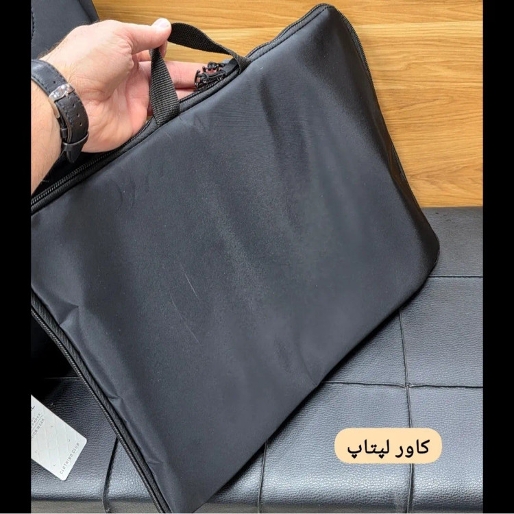کیف اداری لپتاپی 3 کاره بنلتون جنس دیبا ضخیم رنگ مشکی