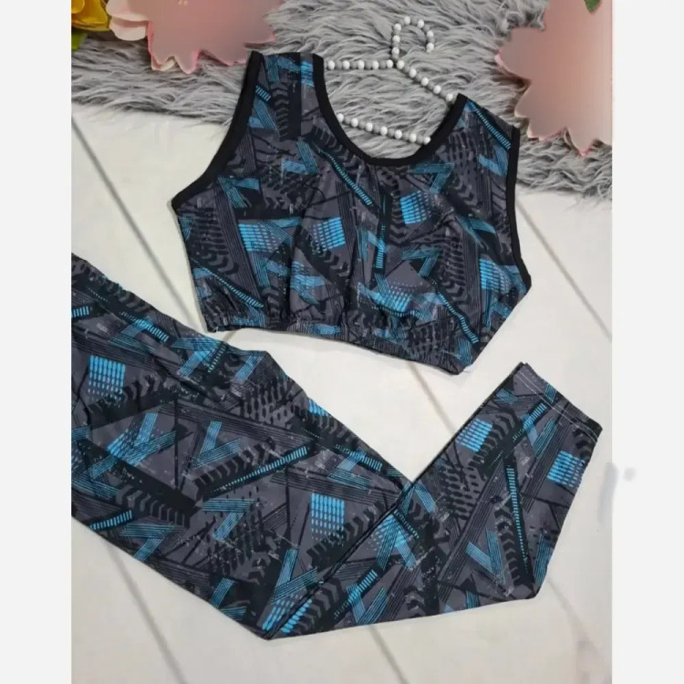 ست ورزشی زنانه نیم تنه و شلوار فول کش جنس فلامنت فری سایز
