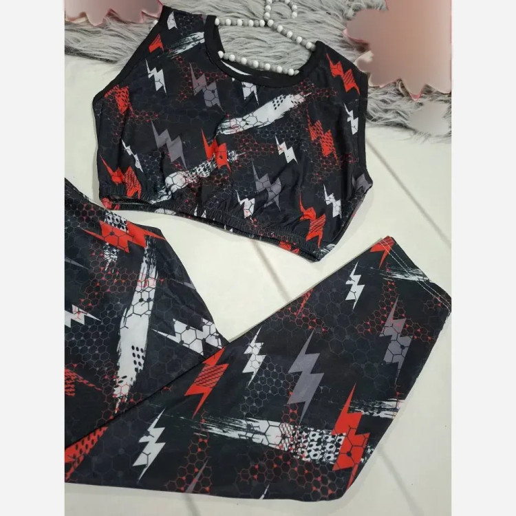 ست ورزشی زنانه نیم تنه و شلوار فول کش جنس فلامنت فری سایز