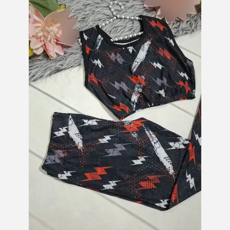 ست ورزشی زنانه نیم تنه و شلوار فول کش جنس فلامنت فری سایز